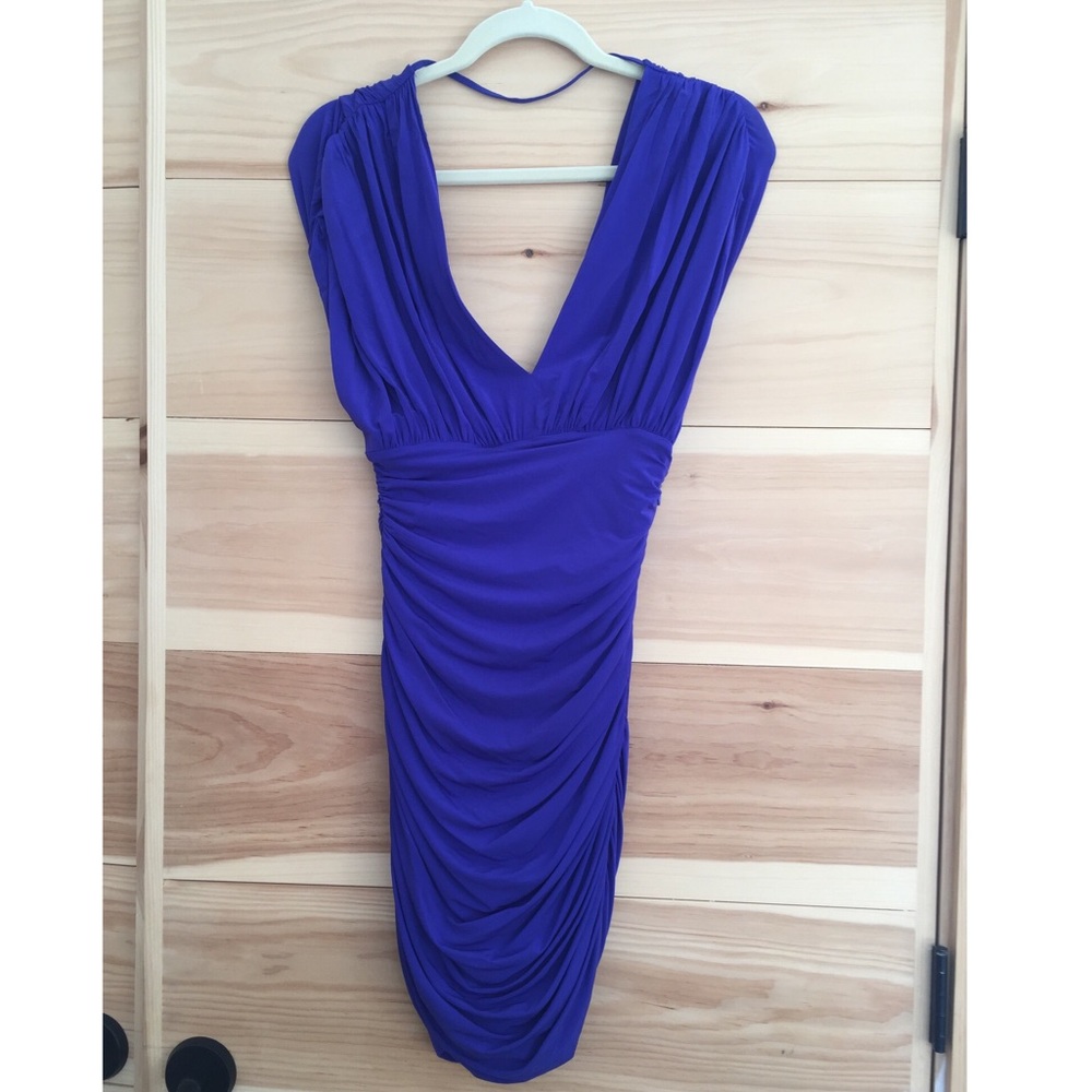 Bcbg MaxAzria purple ruched stretch mini dress.